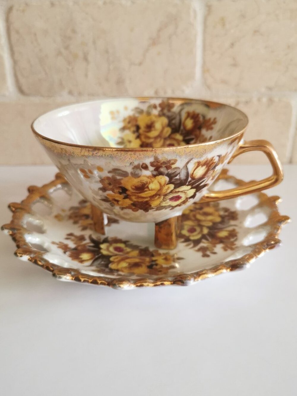 Iridescent 3-Footed Teacup with Saucer Cutouts Yellow Gold Brown Vintage